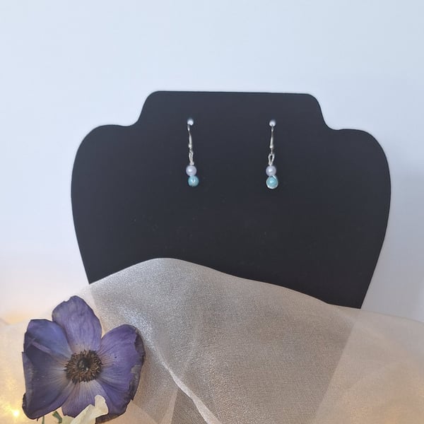 Pearl- effect and blue bead earrings