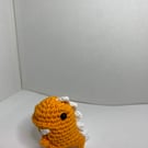 Small handmade crocheted dinosaur amigurami 