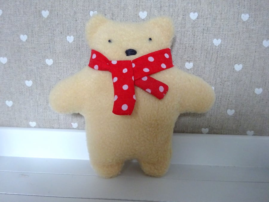hand stitched teaddy bear with red scarf