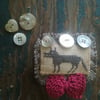 Textile art brooch, wolf, cross stitch, primitive, folk art style 