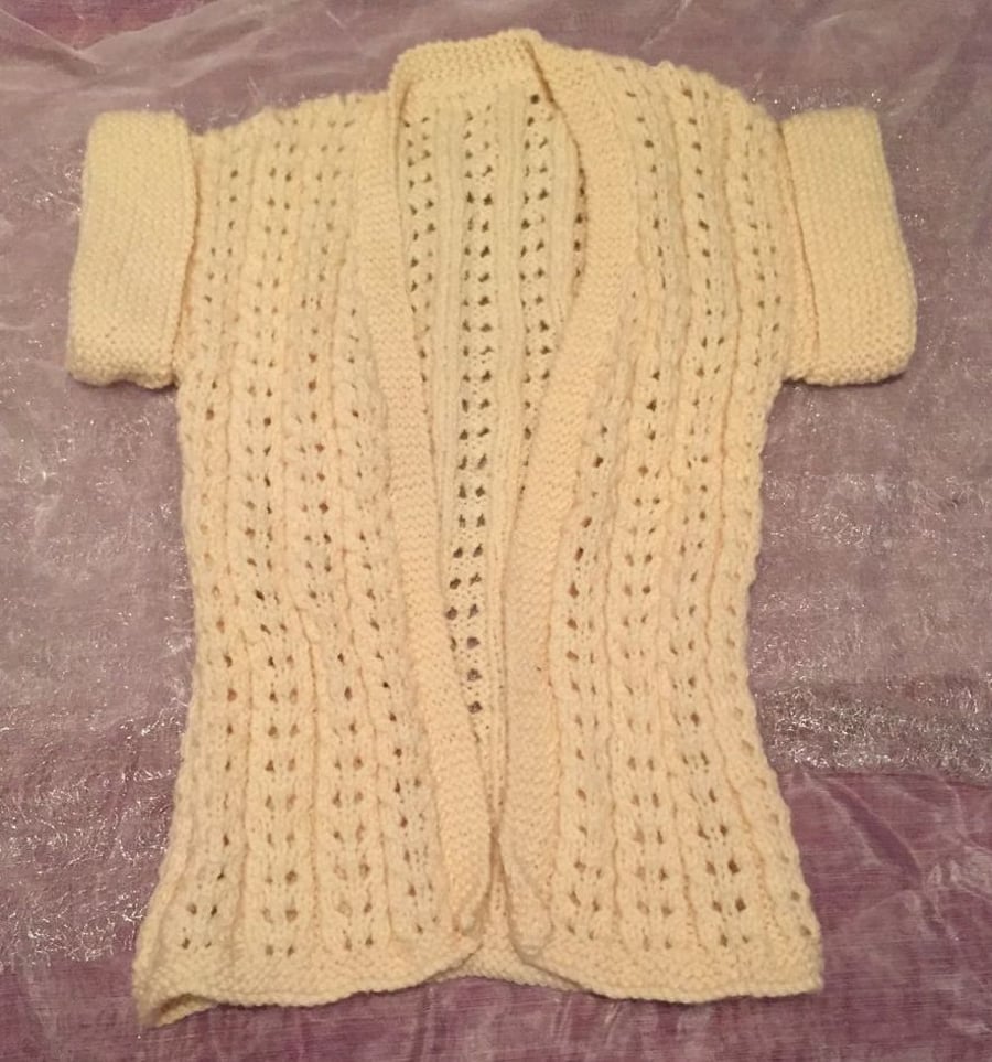 Little white knitted cardigan