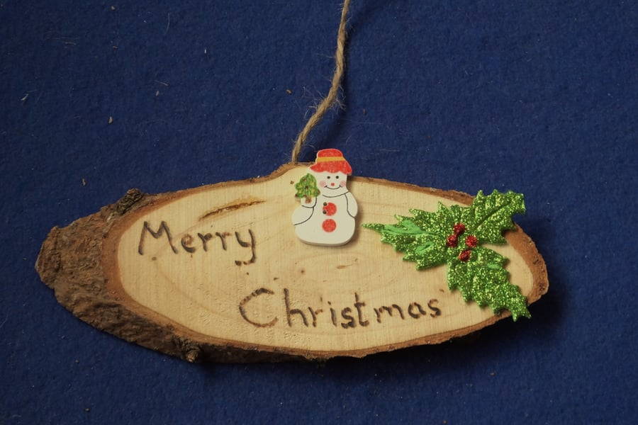 Merry Christmas natural wooden decoration or sign for Christmas time