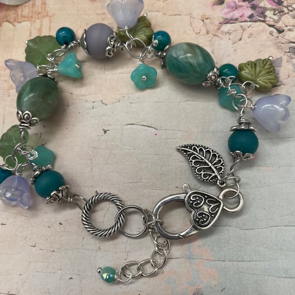 Beaded charm bracelet, Pretty handmade lilac and green floral adjustable gift 