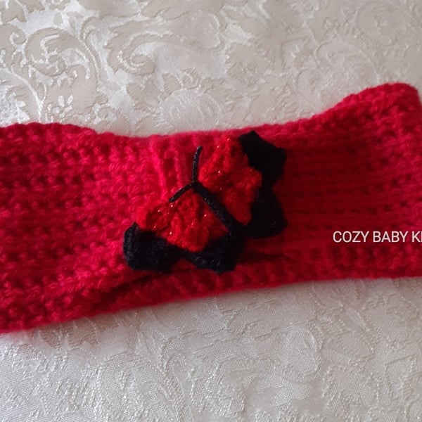 EARWARMER WITH A BUTTERFLY MOTIF
