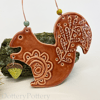 Ceramic squirrel with acorn decoration 