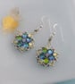 Iridescent Star Flower Beaded Earrings - Image 1