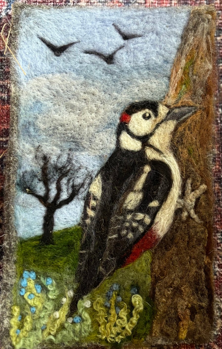 Woodpecker with bluebells
