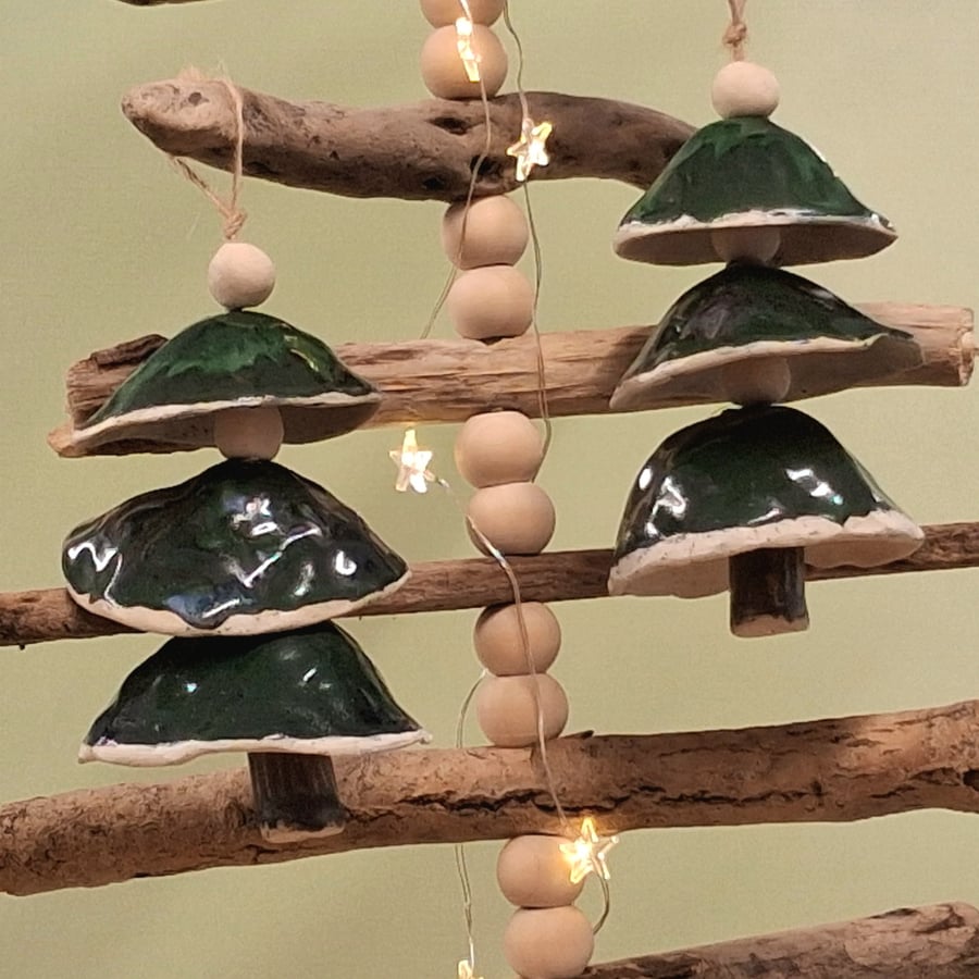 Ceramic tiered Christmas tree bell