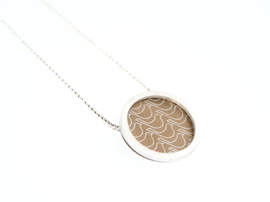 Silver and bronze circle necklace - bird pattern