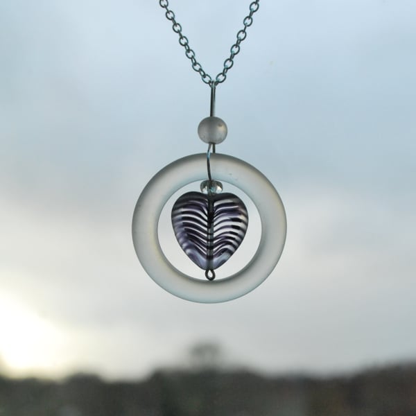 Glass ring pendant with heart