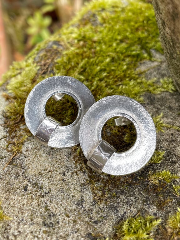 large circular sterling silver stud earrings