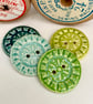 Set of four handmade ceramic buttons