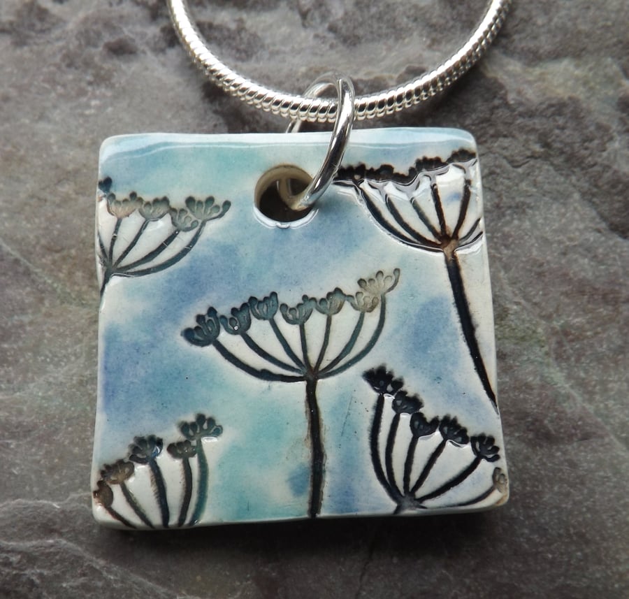 Handmade Ceramic Cow Parsley pendant in turquoise and blue