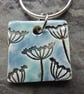 Handmade Ceramic Cow Parsley pendant in turquoise and blue - Image 1