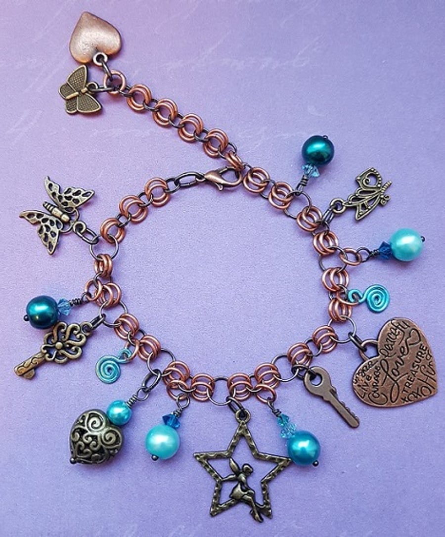 Copper and Antique bronze tones Fairy charm bracelet.