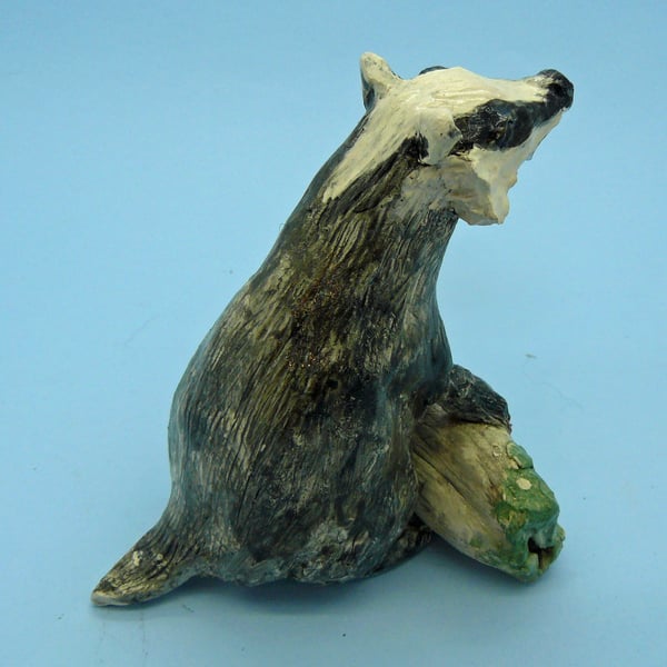 Ceramic Badger on log