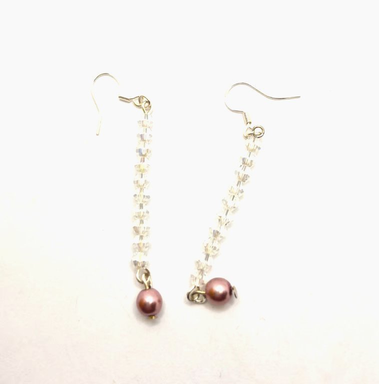 Handmade dangle earrings made with Swarovski crystals and faux pearls