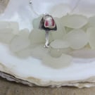 Clear and red sea glass and silver mushroom pendant P17