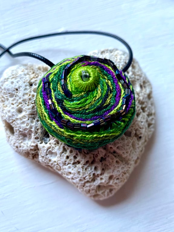 Forest greens swirling, Hand embroidered pendant 