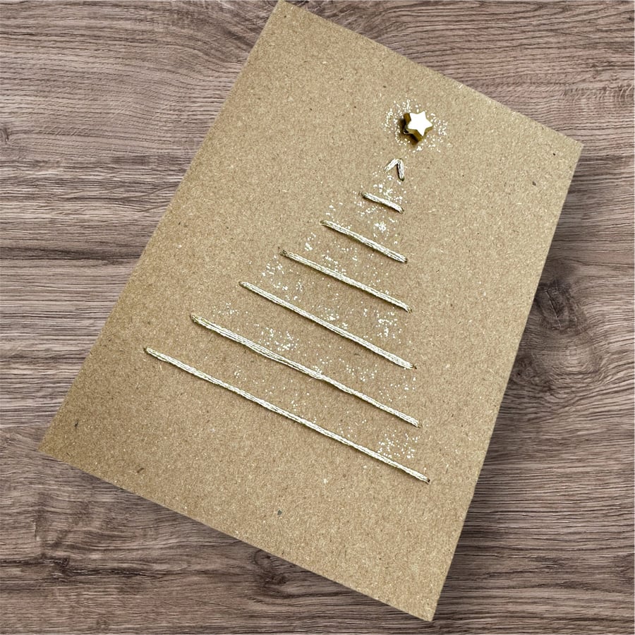 Natural recycled Christmas card of a gold embroidered tree with star and glitter