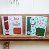 Set of 2 Christmas cards Santa, snow globes and candy canes. 