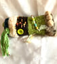 Twiddle mitt multi sensory aid