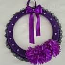 Purple yarn wrapped wreath