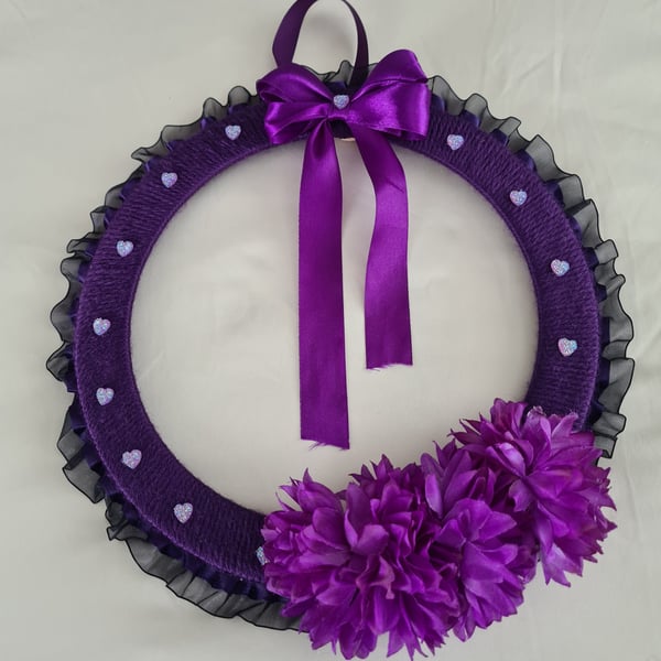 Purple yarn wrapped wreath