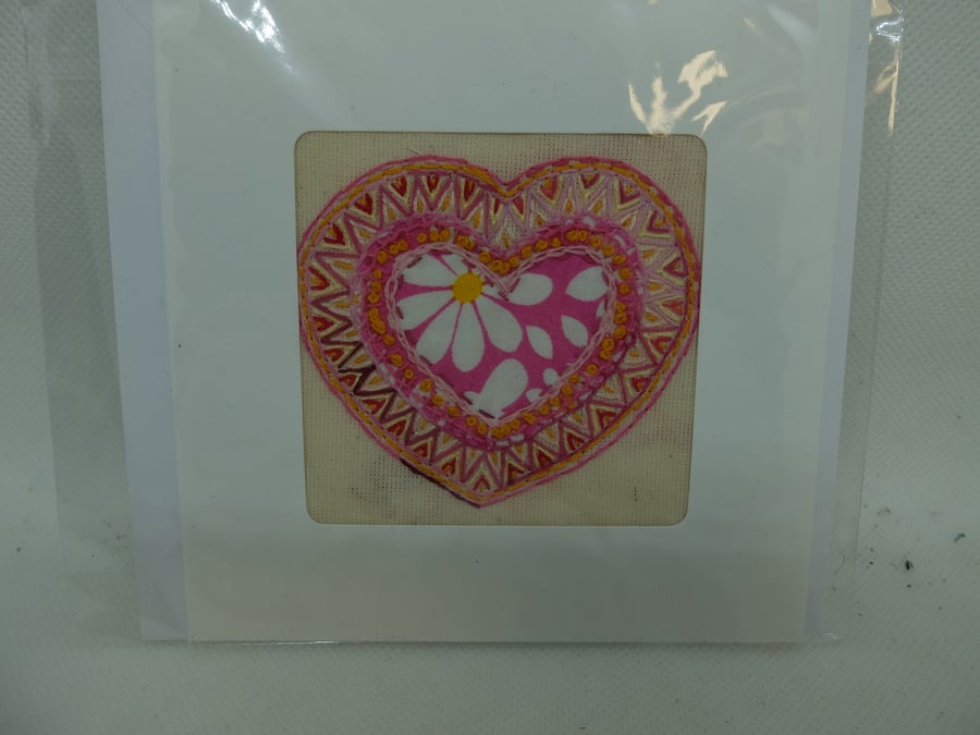 Pink heart applique and embridery