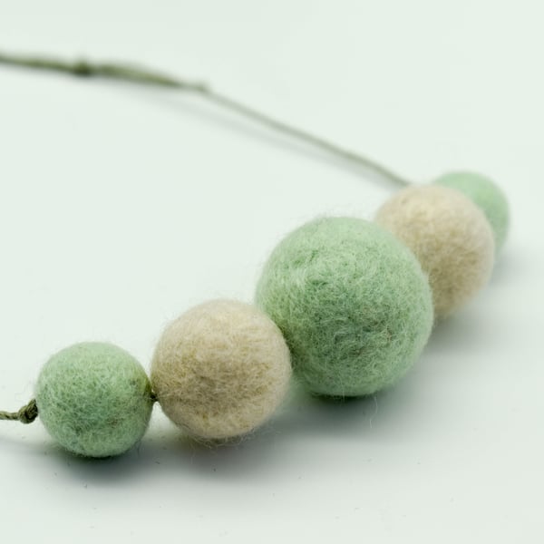SOLD - Felted bead necklace in cream and mint green wool