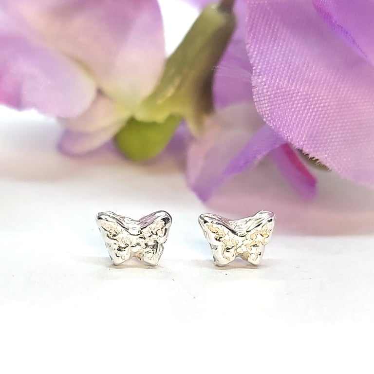 Tiny silver butterfly stud earrings