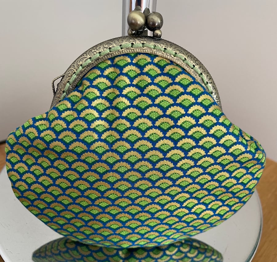 Clasp Purse in a Blue, Green & Gold Scale Designed Fabric.
