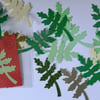 25 oak leaf shaped Sizzix die cuts for card embellishments & crafting.