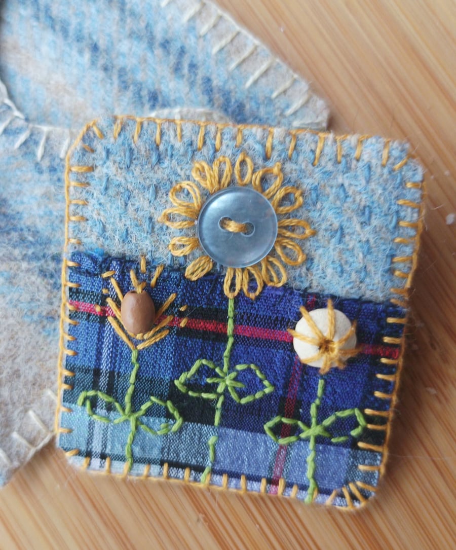 Brooch upcycled and hand stitched 