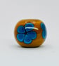 Handmade teal and mustard daisy patterned lamp work glass beads - Image 2