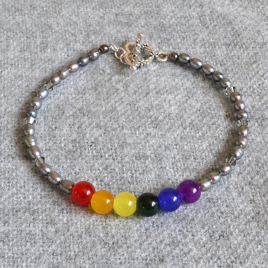 Pride Flag Bracelet with Glass Beads, Grey Oval Glass Pearls, and Smoky Crystals