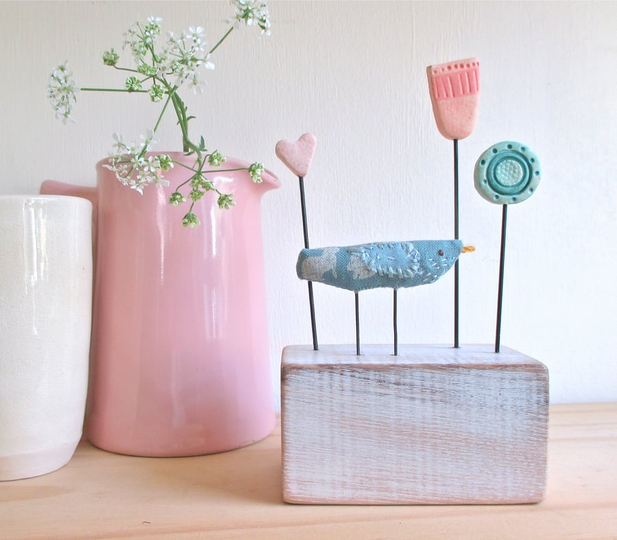 Little Fabric Bird with Two Clay Flowers and a Heart