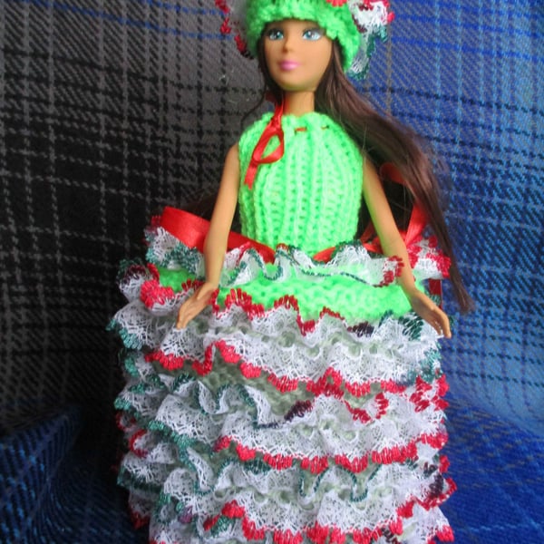 Hand Knitted miss Festive Doll Spare Toilet Roll Cover