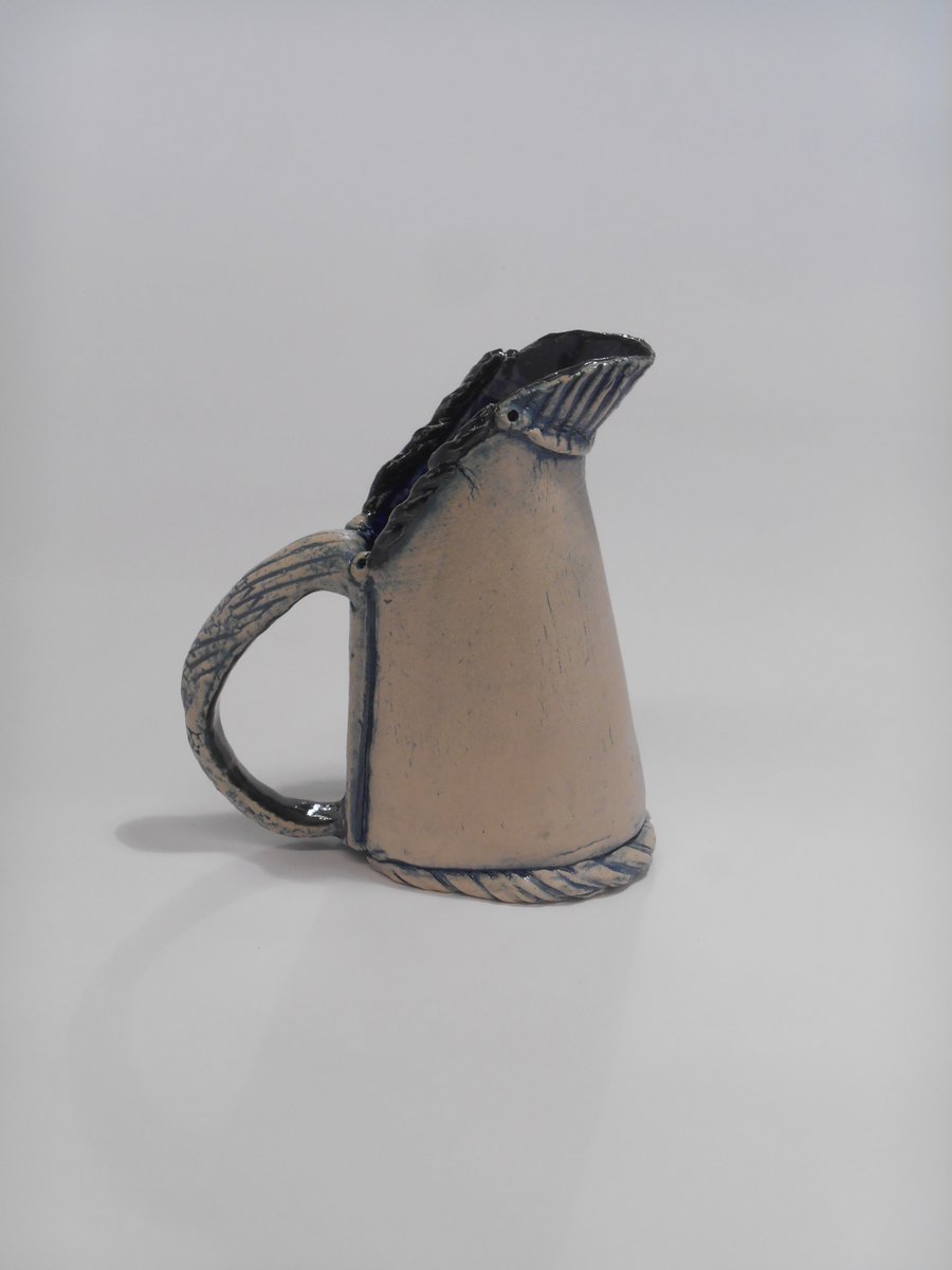 Jug Horse shoe based ceramic.