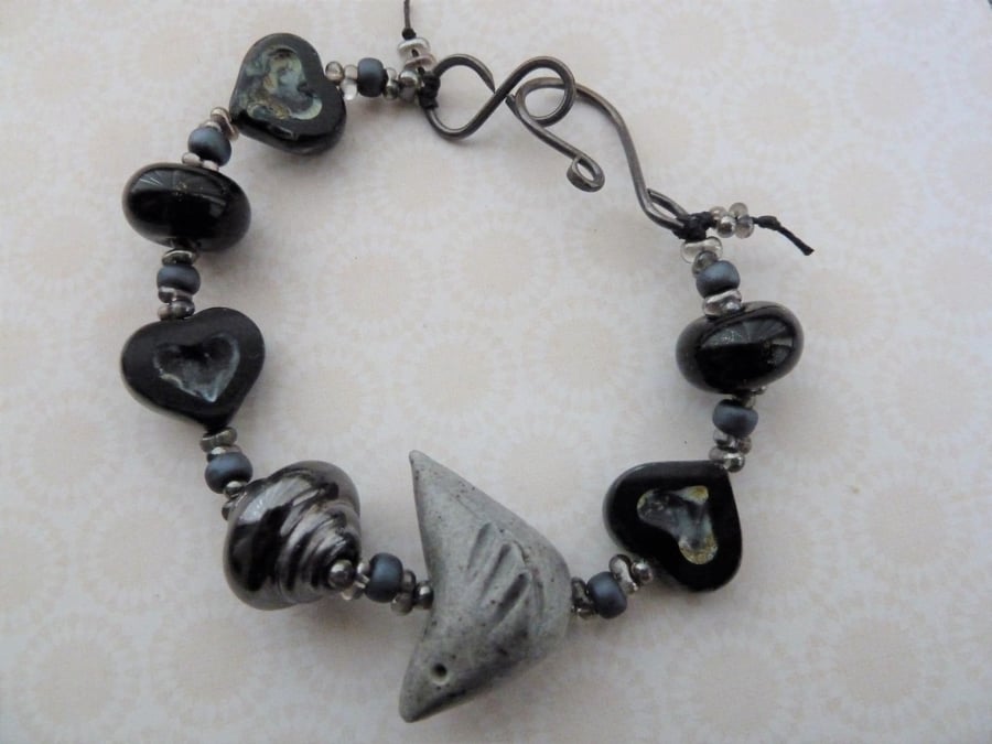 grey and black ceramic bird bracelet