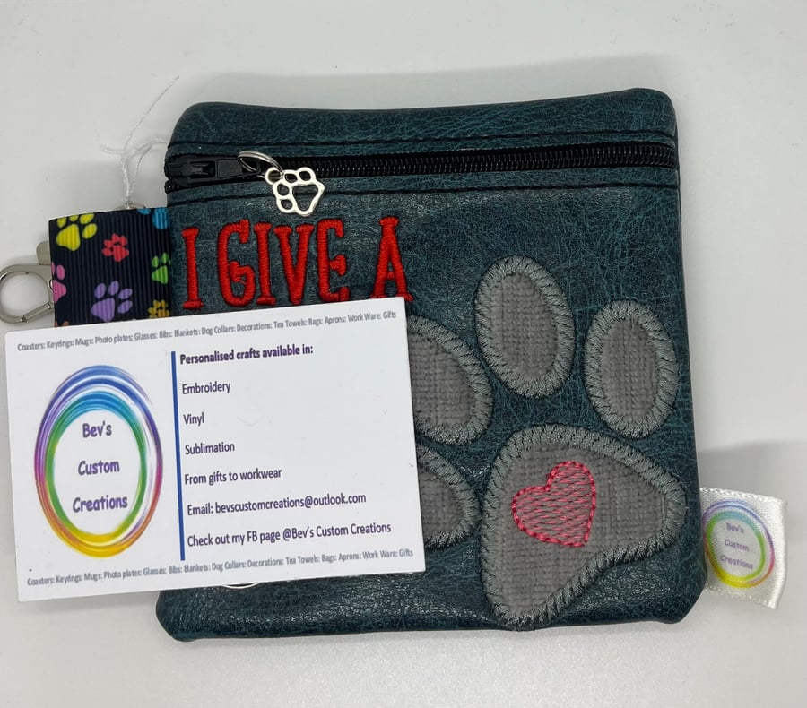 I give a Cr.., Embroidered Poo bag dispenser.  