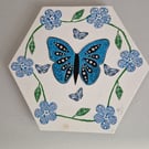 Blue butterfly and flowers. 