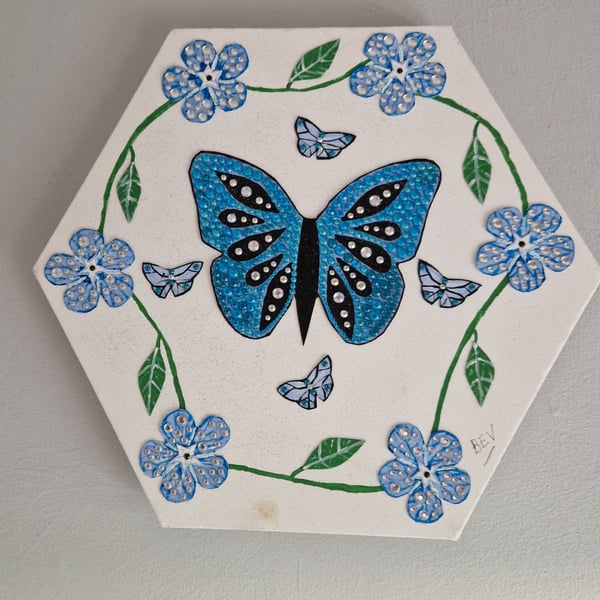 Blue butterfly and flowers. 