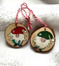 2 cheeky Christmas gnomes on wood circles 