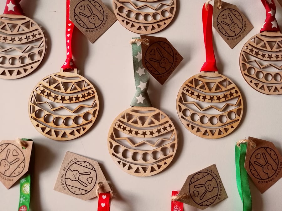 Laser cut bauble ... with a choice of red ribbon designs