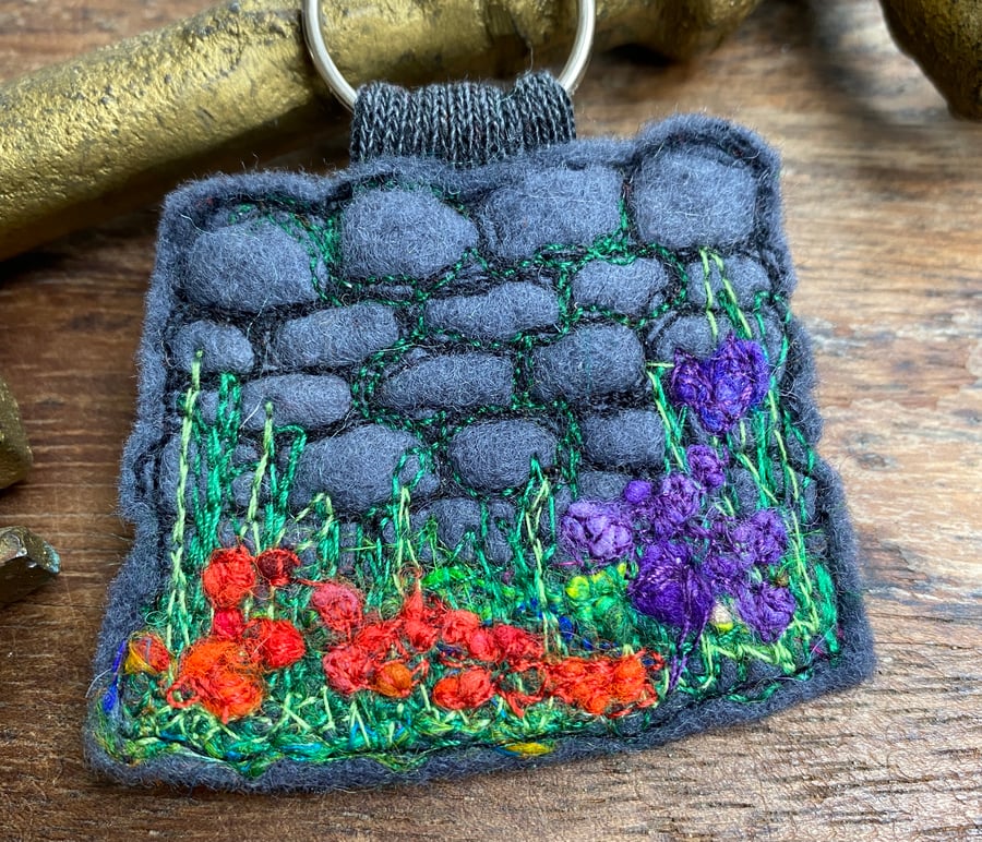 Embroidered flower keyring or bag charm. 