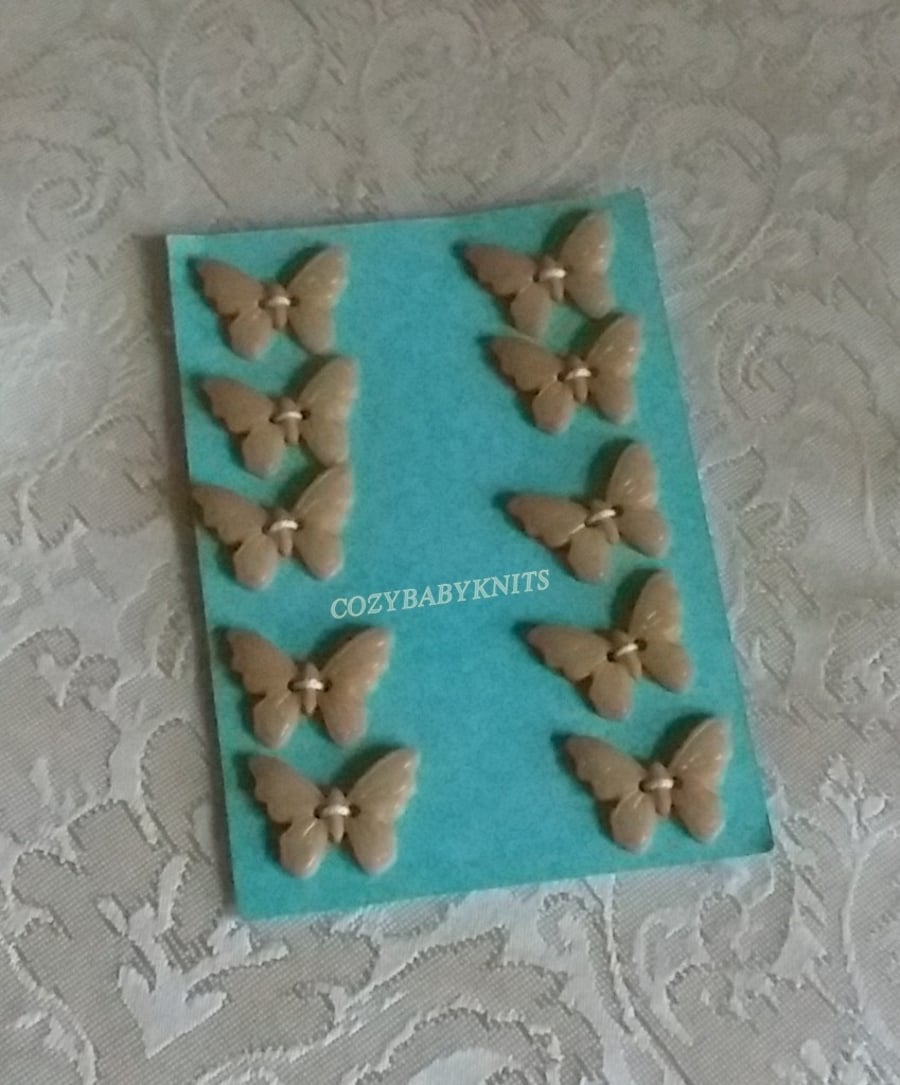 Butterfly plastic buttons