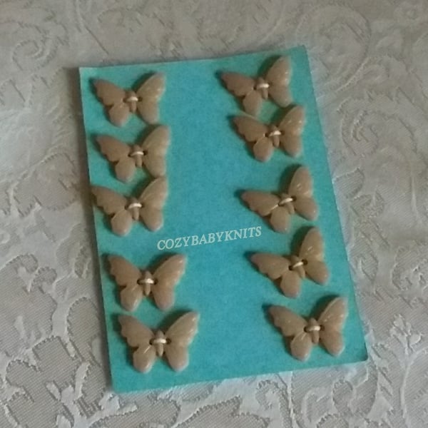 Butterfly plastic buttons