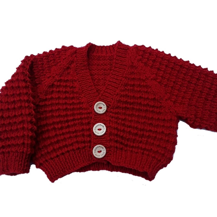 Hand knitted baby cardigan in fox red brown textured pattern Seconds Sunday