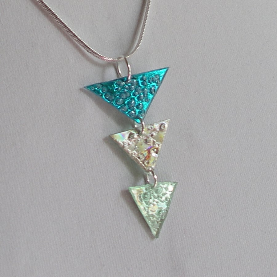 Three triangular piece pendant. Dark turquoise, silver and pale green.